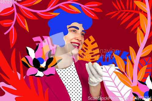 Image of Portrait of a young woman with freaky appearance, look and bright colorful painted design
