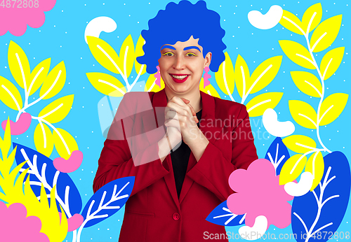 Image of Portrait of a young woman with freaky appearance, look and bright colorful painted design