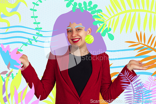 Image of Portrait of a young woman with freaky appearance, look and bright colorful painted design