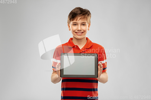 Image of happy smiling boy using tablet computer