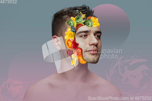 Image of Portrait of beautiful young man with modern floral design, inspiration artwork. Fashion, beauty, summer concept.