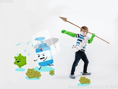 Image of Little caucasian boy as a warrior in fight with coronavirus pandemic, bright design with cute and funny cartoons style drawings