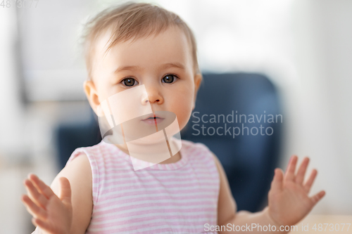 Image of portrait of little baby girl at home