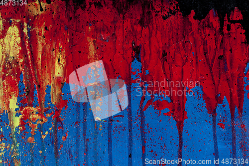 Image of Blue, red and black colored wall texture background.