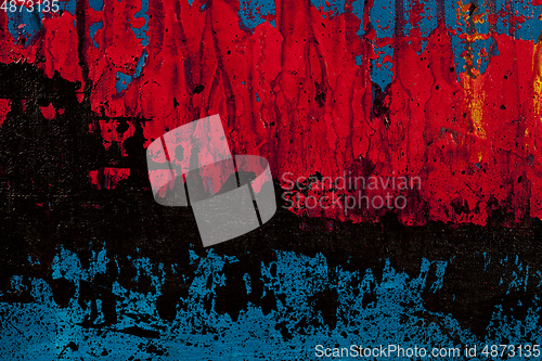 Image of Blue, red and black colored wall texture background.