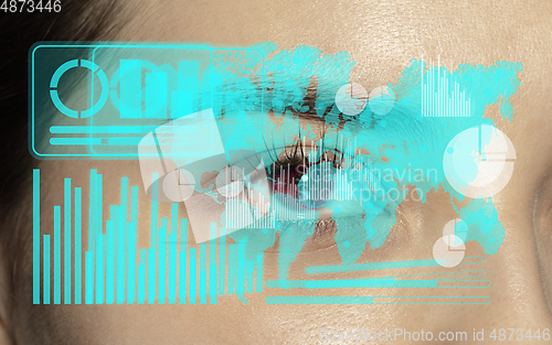 Image of Interface modern technology and digital layer effect in front of close up human eye full of sadness as business, finance crisis, economics recession, unemployment concept