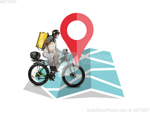 Image of Home delivery, food purchase via the Internet. Deliveryman on bike arriving to any address worldwide on the map with your order.