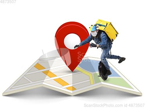 Image of Home delivery, food purchase via the Internet. Deliveryman on unicycle arriving to any address worldwide on the map with your order.