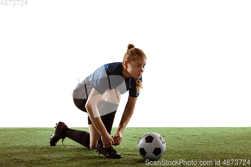 Image of Female soccer, football player preparing for game isolated on white background