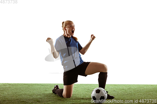 Image of Female soccer, football player celebrating goal winning with bright expressive emotions isolated on white background