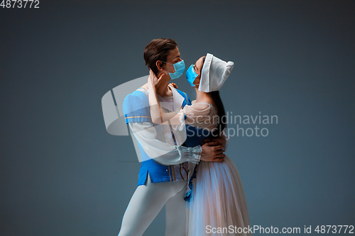 Image of Young and graceful ballet dancers as Cinderella fairytail characters.