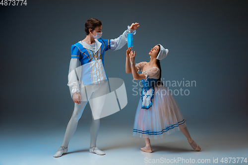 Image of Young and graceful ballet dancers as Cinderella fairytail characters.