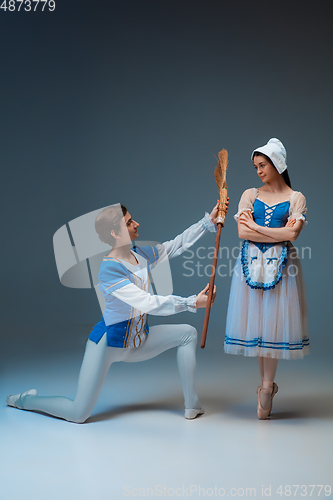 Image of Young and graceful ballet dancers as Cinderella fairytail characters.