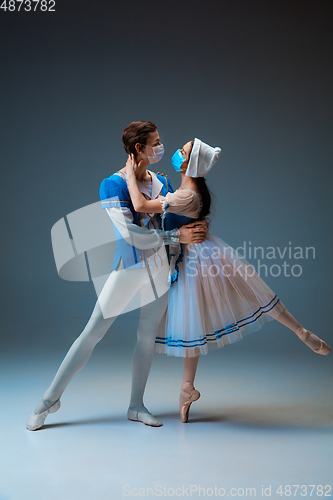 Image of Young and graceful ballet dancers as Cinderella fairytail characters.