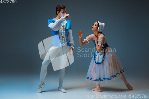 Image of Young and graceful ballet dancers as Cinderella fairytail characters.