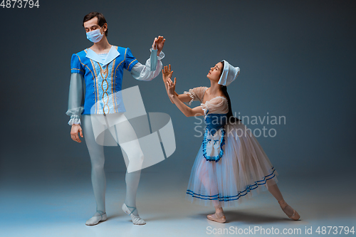 Image of Young and graceful ballet dancers as Cinderella fairytail characters.