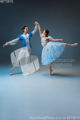 Image of Young and graceful ballet dancers as Cinderella fairytail characters.