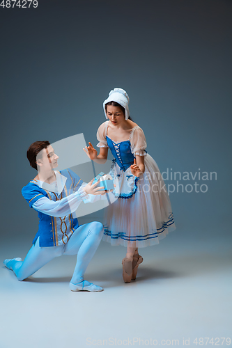 Image of Young and graceful ballet dancers as Cinderella fairytail characters.