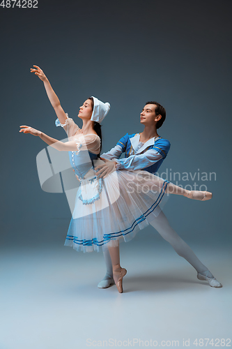 Image of Young and graceful ballet dancers as Cinderella fairytail characters.