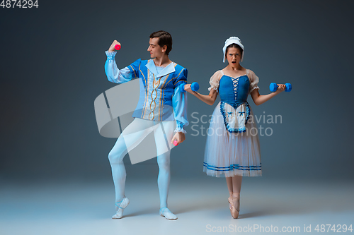 Image of Young and graceful ballet dancers as Cinderella fairytail characters.