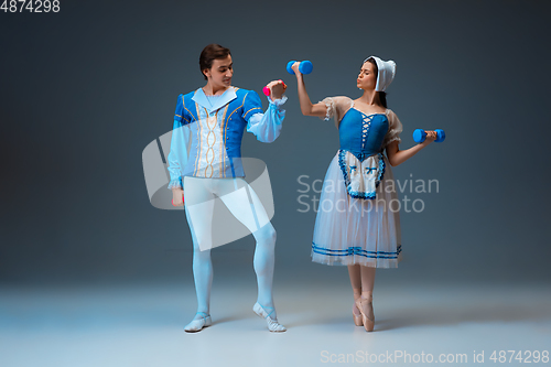 Image of Young and graceful ballet dancers as Cinderella fairytail characters.