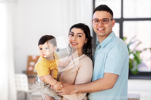 Image of happy family with child at home