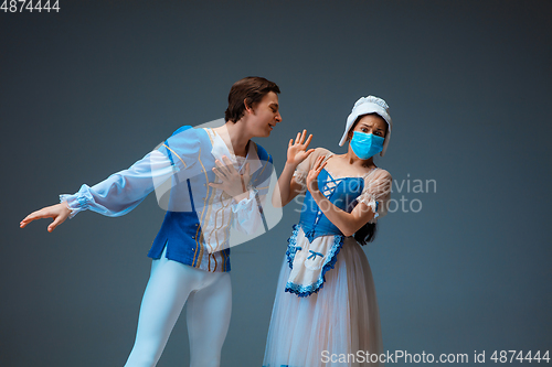 Image of Young and graceful ballet dancers as Cinderella fairytail characters.