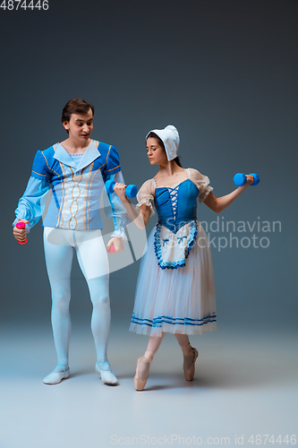 Image of Young and graceful ballet dancers as Cinderella fairytail characters.