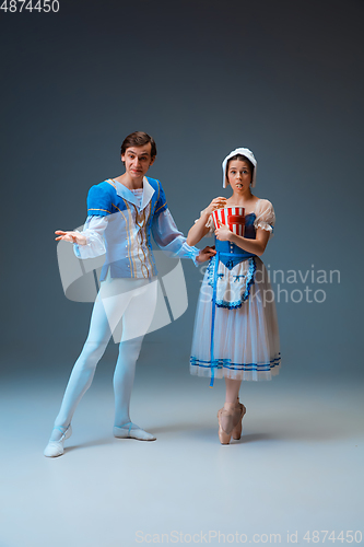 Image of Young and graceful ballet dancers as Cinderella fairytail characters.