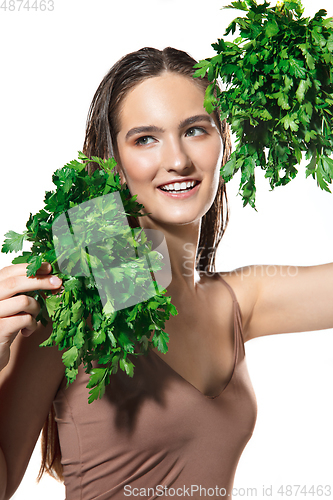 Image of Close up of beautiful female face with organic treatment over white background. Cosmetics and makeup, natural and eco treatment, skin care.