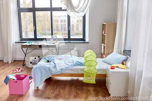 Image of messy home or kid's room with scattered stuff