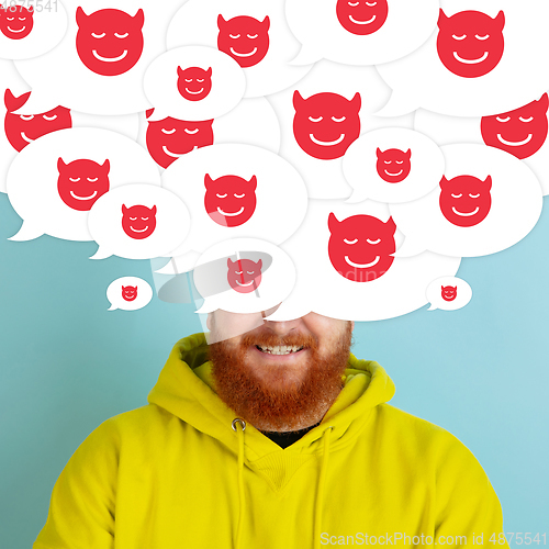 Image of Man with big speech bubbles on his head like a hairstyle