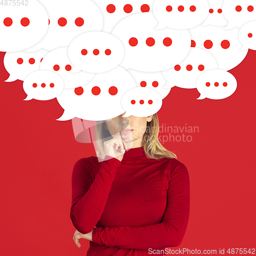 Image of Woman with big speech bubbles on her head like a hairstyle