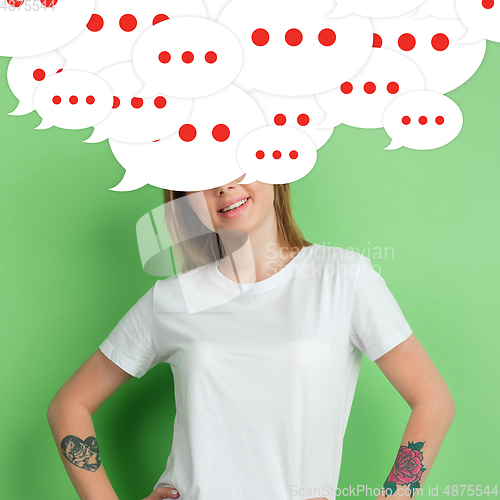 Image of Woman with big speech bubbles on her head like a hairstyle