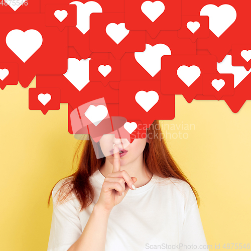 Image of Woman with big speech bubbles on her head like a hairstyle