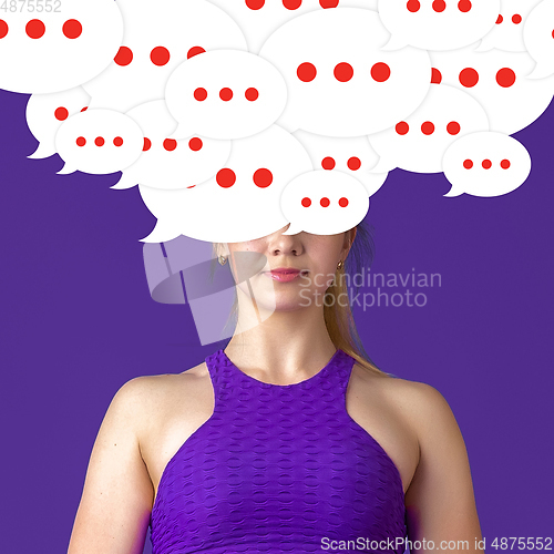 Image of Woman with big speech bubbles on her head like a hairstyle