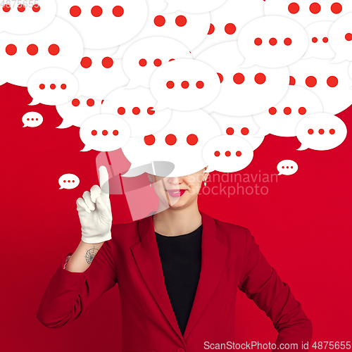 Image of Woman with big speech bubbles on her head like a hairstyle