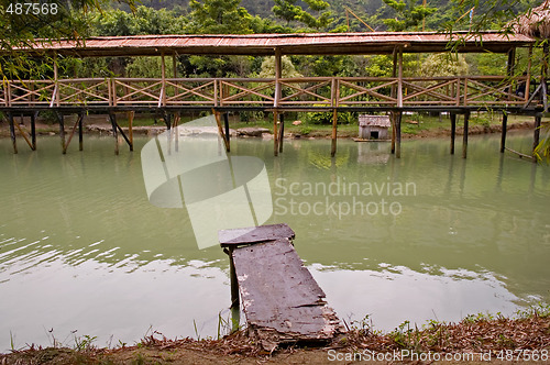 Image of Wood arbor and walk bridge