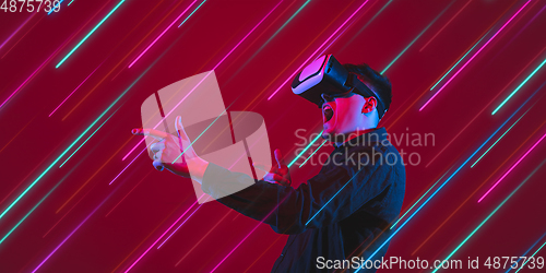Image of Neon lighted, colored portrait with neon lines, flyer, proposal