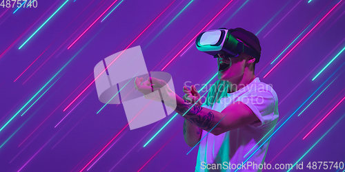 Image of Neon lighted, colored portrait with neon lines, flyer, proposal
