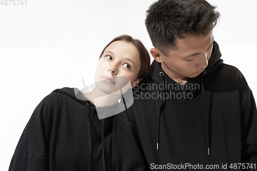 Image of Trendy fashionable couple isolated on white studio background