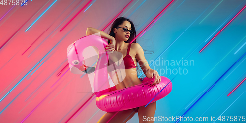 Image of Neon lighted, colored portrait with neon lines, flyer, proposal