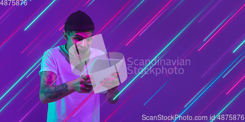 Image of Neon lighted, colored portrait with neon lines, flyer, proposal