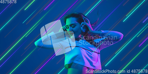 Image of Neon lighted, colored portrait with neon lines, flyer, proposal