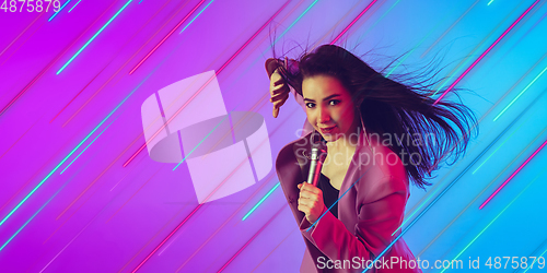 Image of Neon lighted, colored portrait with neon lines, flyer, proposal