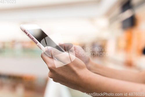 Image of Woman use of mobile phone