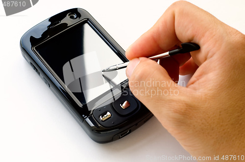 Image of Holding pda and stylus