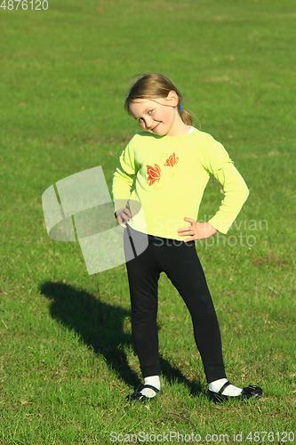 Image of little girl standing at in the majestic position