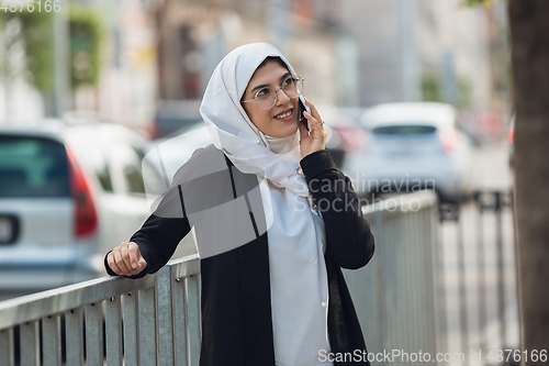 Image of Beautiful muslim successful businesswoman portrait, confident happy CEO