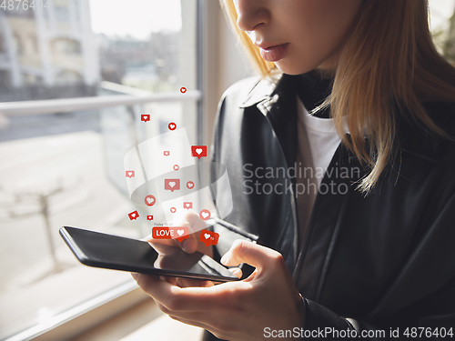 Image of Girl connecting and sharing social media. Modern UI icons, communication, devices